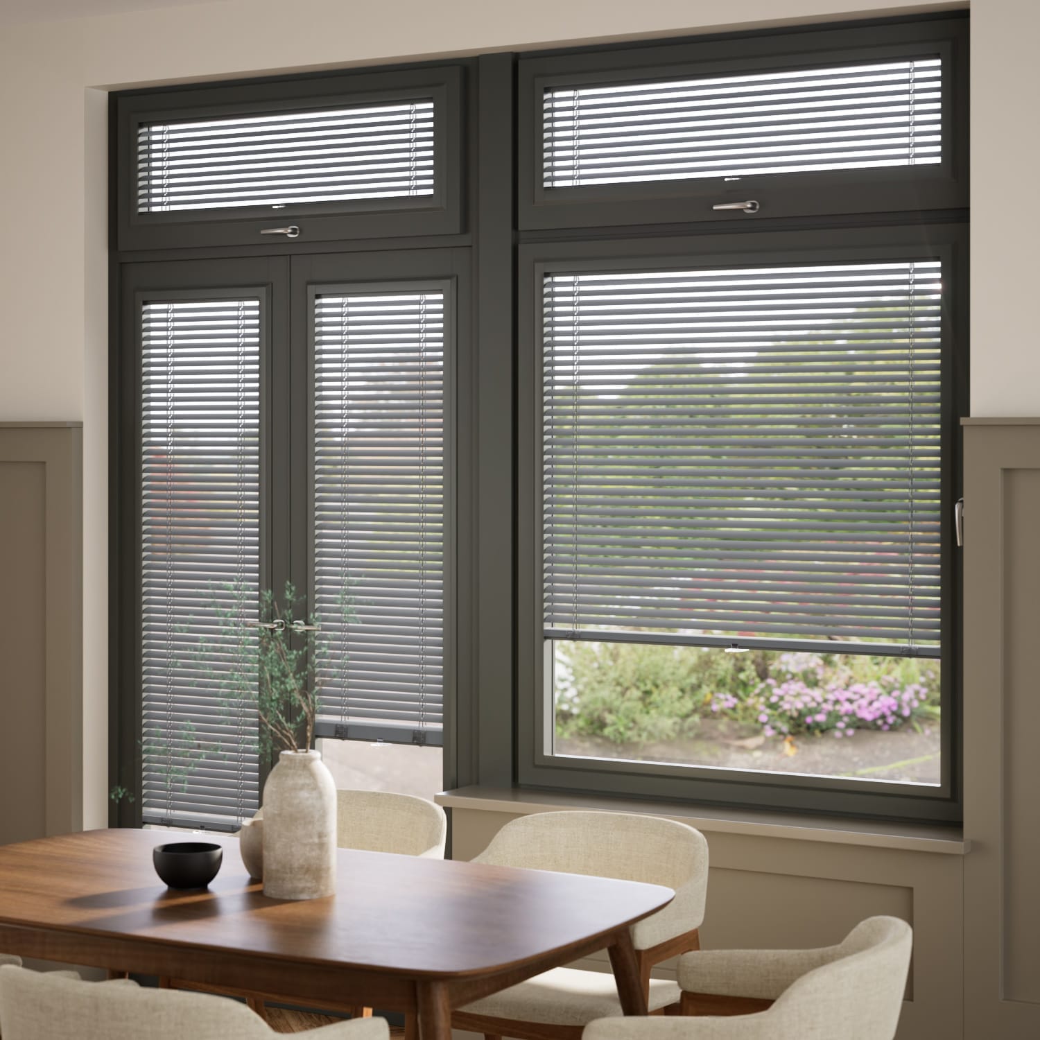 Anthracite uPVC French doors and large windows with integrated Venetian blinds in a modern dining room